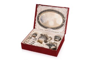 AN INDONESIAN SILVER TEA SERVICE PRESENTED BY PRESIDENT SOEHARTO