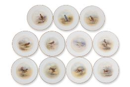 A SET OF ELEVEN ROYAL WORCESTER 'GAME BIRDS' PORCELAIN SIDE PLATES (11)