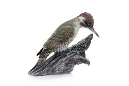 A 'ROSENTHAL' PORCELAIN MODEL OF A WOODPECKER