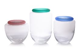 A GROUP OF THREE IVV GLASS JARS WITH COLOURED LIDS