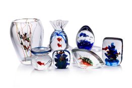 A GROUP OF SEVEN GLASS FISH PAPERWEIGHTS AND VASE