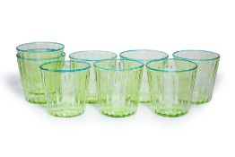 A GROUP OF EIGHT GREEN GLASS TUMBLERS