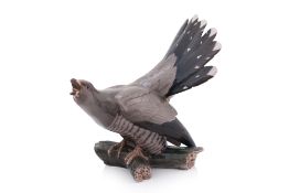 A BING AND GRONDAHL PORCELAIN MODEL OF A CUCKOO