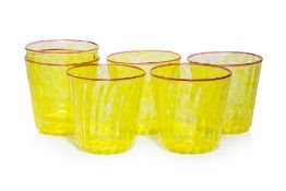A GROUP OF SIX YELLOW GLASS TUMBLERS