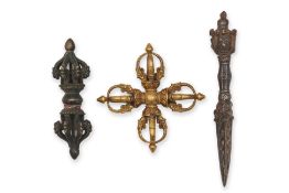 TWO HIMALAYAN BRONZE VAJRA AND A PHURBA DAGGER