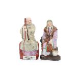 TWO POLYCHROME PORCELAIN FIGURES
