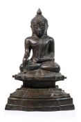 A BURMESE BRONZE SEATED BUDDHA