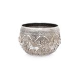 A BURMESE SILVER BOWL WITH SCENES OF BUDDHA