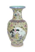 A LARGE AND IMPRESSIVE YELLOW-GROUND FAMILLE ROSE PORCELAIN VASE