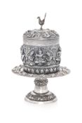 A BURMESE SILVER TABLE BOX AND STAND