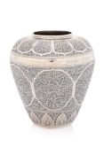 A SOUTH EAST ASIAN SILVER VASE