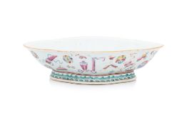 A FAMILLE ROSE 'PRECIOUS OBJECTS' FOOTED DISH