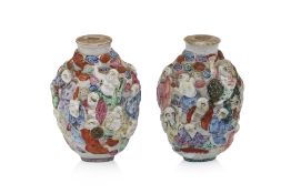 A PAIR OF FAMILLE ROSE PORCELAIN '18 ARHAT' SNUFF BOTTLES