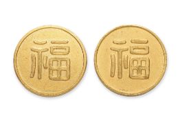 A PAIR OF HIGH KARAT GOLD MEDALLIONS