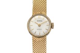 TITUS - A 14K GOLD LADIES WATCH (CASE STEEL)