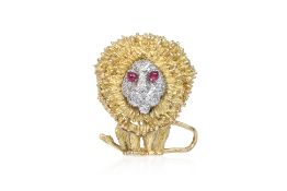 A RUBY AND DIAMOND TWO TONE LION BROOCH
