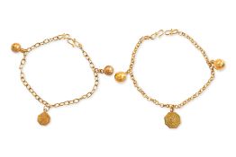 A PAIR OF GOLD BRACELETS