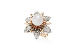 AN AKOYA CULTURED PEARL AND DIAMOND TWO TONE RING