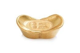 A HIGH KARAT GOLD INGOT BY CHOW TAI FOOK