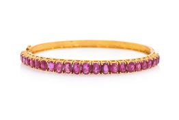 AN UNHEATED BURMESE RUBY BANGLE