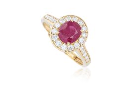 A RUBY AND DIAMOND 'HALO' RING