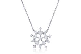 A DIAMOND SNOWFLAKE PENDANT NECKLACE BY TASAKI