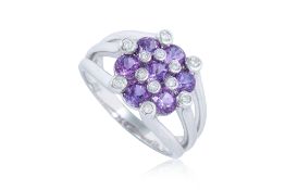 AN AMETHYST AND DIAMOND RING