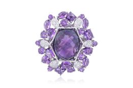 AN AMETHYST AND DIAMOND RING