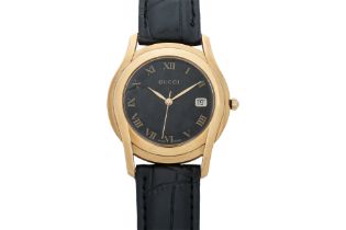 GUCCI - A GOLD-PLATED STAINLESS STEEL DRESS WRISTWATCH