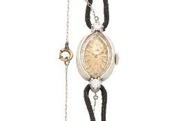 OMEGA - A LADY'S VINTAGE DIAMOND-SET COCKTAIL WRISTWATCH