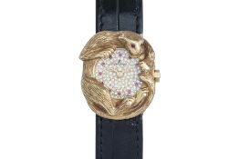 PIA FEERIQUE - AN 18K YELLOW GOLD DIAMOND AND RUBY-SET LADIES WRISTWATCH