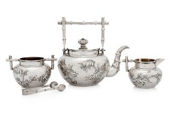 A CHINESE EXPORT SILVER THREE PIECE TEA SERVICE AND TONGS