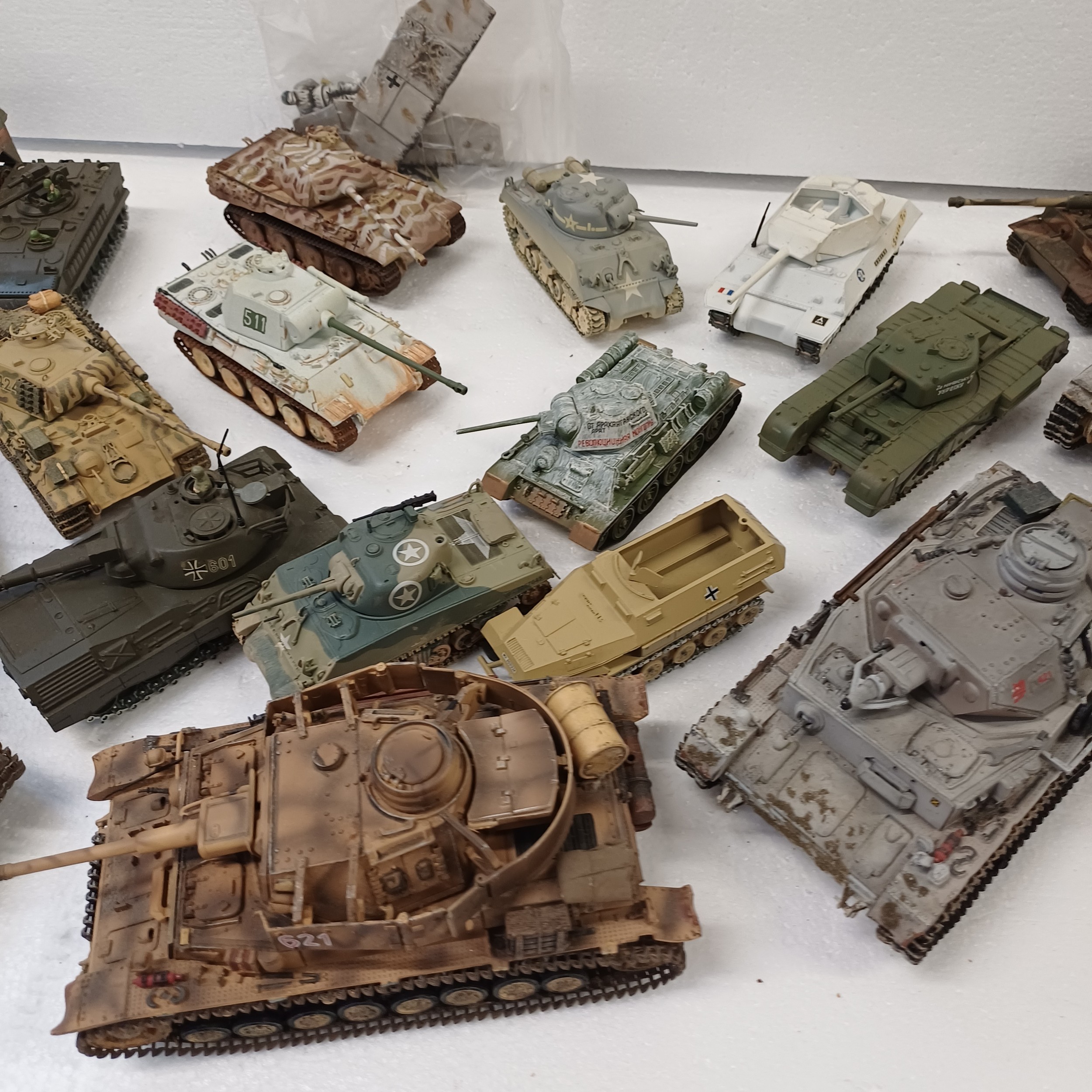 A collection of model tanks, including Corgi, etc.