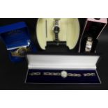 Three lady's wristwatches to include Seksy, Beverly Hills, Philip Mercier, and a gentleman's