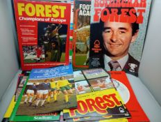 A collection of football programmes and publications including Nottingham Forest, etc.