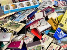 A large collection of matchbox packages, cigarette boxes, etc