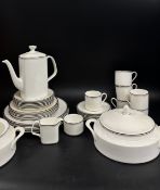 A Royal Doulton Platinum Concorde dinner service including, cups, saucers, tureens, jugs, etc *Not