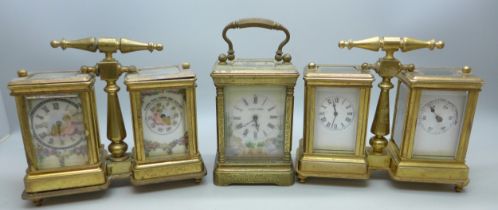 A brass double carriage clock and barometer with painted panels (a/f) with one
