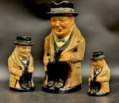 Three Royal Doulton graduating Winston Churchill character jugs, largest 22cm h (medium sized one