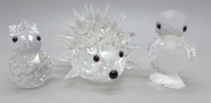 Three small Swarovski crystal figures, hedgehog, chick and rabbit, boxed