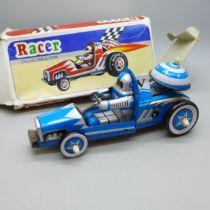 A tin plate Racer clockwork car, boxed