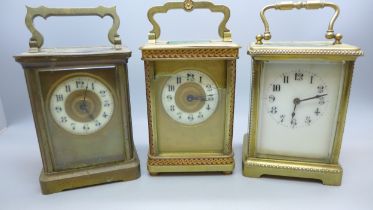 Three late 19th / early 20th Century French brass carriage clocks, two with keys, one a/f with
