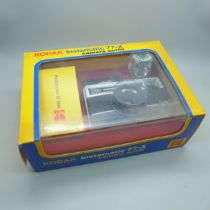 A Kodak Instamatic 77-X camera outfit, boxed