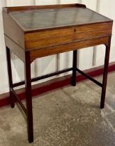 A George III mahogany and green leather clerks desk