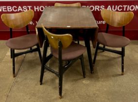A G-Plan Librenza tola wood and black dropleaf table and four butterfly back chairs