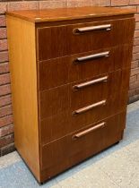 A teak chest of drawers