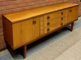 A Beautility teak sideboard
