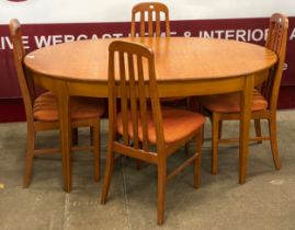 A Jentique teak oval extending dining table and four chairs
