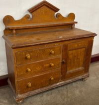 A Victorian scumbled pine Lincolnshire dresser