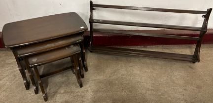 An Ercol Golden Dawn ash nest of tables and wall hanging plate rack